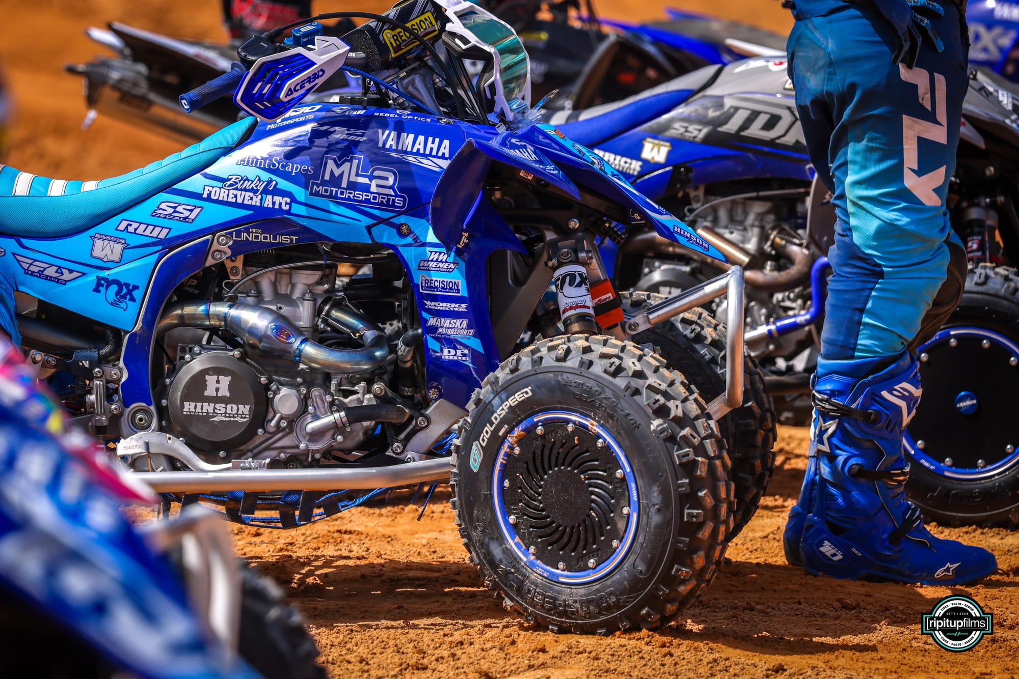RWI-backed race quad staged in the paddock before a moto